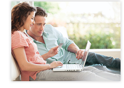 A couple handle eBilling on their computer 